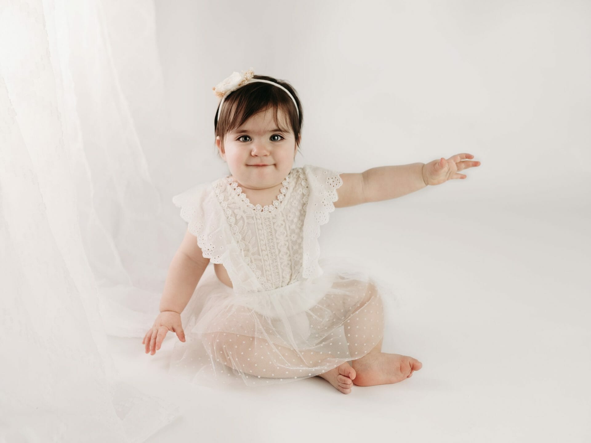 white backdrop twin baby girl