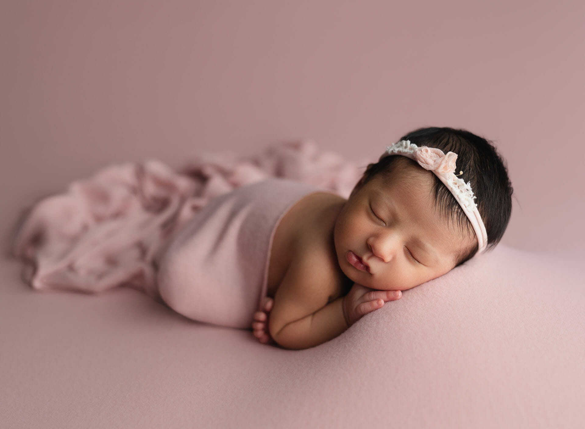 newborn baby girl pink bow with brother