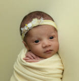 newborn baby girl yellow