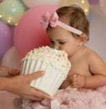 baby girl face in cake